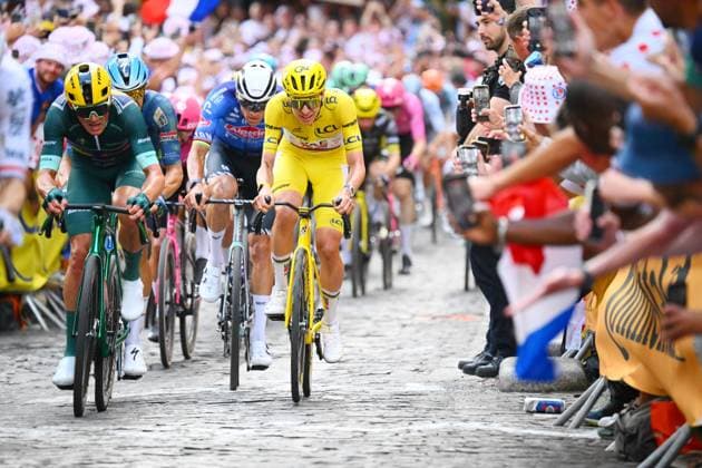 Danish Mads Pedersen of Lidl-Trek, Dutch Mathieu van der Poel of Alpecin-Premier Tech and Slovenian Tadej Pogacar of UAE Team Emirates XRG pictured in action during stage 21 of the 2026 Tour de France cycling race, a stage of 130km from Thoiry to Paris Champs-Elysees , on Sunday 26 July 2026. The 113th edition of the Tour de France starts on Saturday 4 July in Barcelona, Spain, and will finish in Paris, France on the 26th of July. POOLxLUCAxBETTINI  x182108240x
