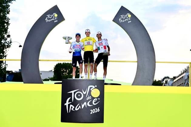 Sport Bilder des Tages Tour de France 2026 Stage 21 PARIS CHAMPS-ELYSEES, FRANCE - JULY 26 : Pogacar Tadej (SLO) of UAE Team Emirates - XRG, Evenepoel Remco (BEL) of Red Bull - BORA - Hansgrohe, Del Toro Isaac (MEX) of UAE Team Emirates - XRG pictured during the podium ceremony of the 113rd edition of Tour de France an UCI World Tour 2.UWT cycling road race stage for Men Elite of 130 km with start in Thoiry and finish in Paris Champs-Elysees on July 26, 2026 in Paris Champs-Elysees, France, 26 07 2026 Paris Champs-Elysees France  Copyright: xPeterxDexVoechtx