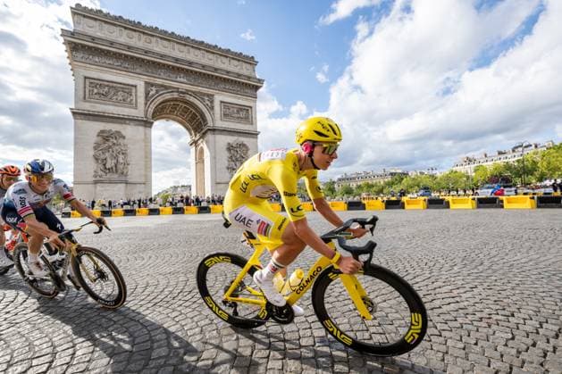 Belgian Remco Evenepoel of Red Bull-BORA-hansgrohe and Slovenian Tadej Pogacar of UAE Team Emirates XRG pictured in action during stage 21 of the 2026 Tour de France cycling race, a stage of 130km from Thoiry to Paris Champs-Elysees , on Sunday 26 July 2026. The 113th edition of the Tour de France starts on Saturday 4 July in Barcelona, Spain, and will finish in Paris, France on the 26th of July. DAVIDxPINTENS  x182121550x