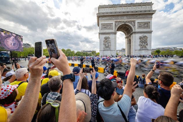 RECORD DATE NOT STATED 26th July 2026, Paris, France; 113th Tour de France Cycling, Stage 21; Fans take photos of the peloton passing the Arc de Triomphe MatthewxHuang