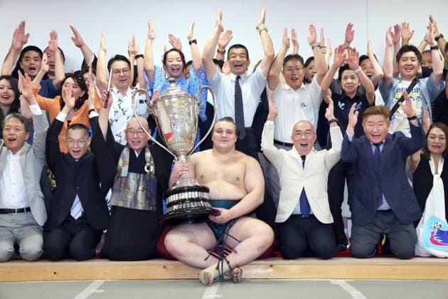 Nagoya Grand Sumo Tournament Sekiwake Aonishiki celebrates after winning the 15-day Nagoya Grand Sumo Tournament at IG Arena in Nagoya, central Japan, on July 26, 2026. (Pool photo)  A14AA0005624086P