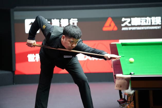 SHANGHAI, CHINA - JULY 27: Tang Hewen of China plays a shot in the first round match against Chris Wakelin of England on day 1 of the Shanghai Masters 2026 at Luwan Gymnasium on July 27, 2026 in Shanghai, China.  Copyright: xTaixChengzhex 111656638071