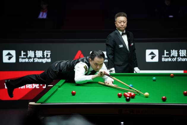 SHANGHAI, CHINA - JULY 27: Xiao Guodong of China plays a shot in the first round match against Xu Jiarui of China on day 1 of the Shanghai Masters 2026 at Luwan Gymnasium on July 27, 2026 in Shanghai, China.  Copyright: xTaixChengzhex 111656640122