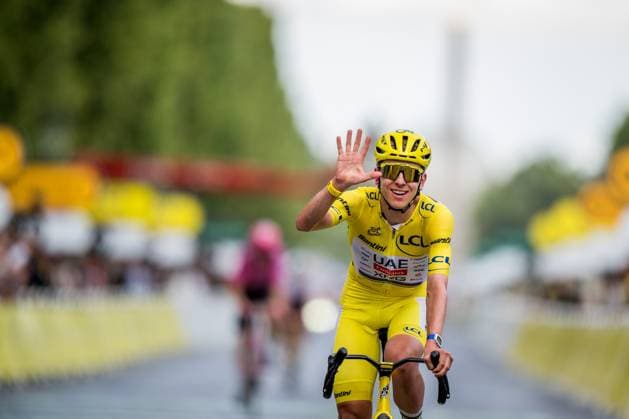 Slovenian Tadej Pogacar of UAE Team Emirates-XRG celebrates as he crosses the finish line at stage 21 of the 2026 Tour de France cycling race, a stage of 130km from Thoiry to Paris Champs-Elysees , on Sunday 26 July 2026. The 113th edition of the Tour de France starts on Saturday 4 July in Barcelona, Spain, and will finish in Paris, France on the 26th of July. JASPERxJACOBS  x182145232x