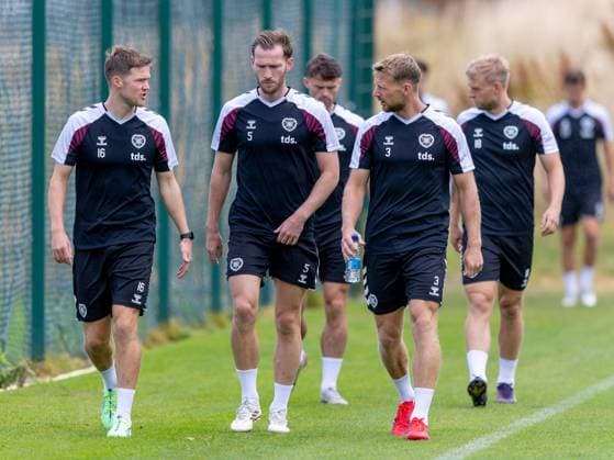 Blair Spittal of Heart of Midlothian Jamie McCart of Heart of Midlothian and Stephen Kingsley of Heart of Midlothian during Hearts training ahead of the clash with Sturm Graz Heart of Midlothian Training, Football, Oriam, Edinburgh, Scotland, UK - 27 Jul 2026Edinburgh Oriam Scotland United Kingdom EDITORIAL USE ONLY No use with unauthorised audio, video, data, fixture lists, club league logos or live services. Online in-match use limited to 120 images, no video emulation. No use in betting, games or single club league player publications.  Copyright: xAlanxRennie Shutterstockx 17015659al