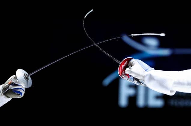 CHINA, HONG KONG - JULY 27, 2026: Lauren Scruggs of the United States (L) and Russia s Anna Solovyova compete in the ladies individual foil event at the 2026 Kerry Fencing World Championships. Mikhail Sinitsyn TASS  95532214