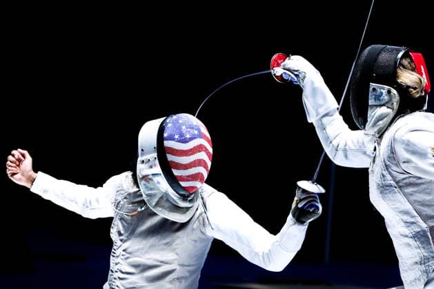 CHINA, HONG KONG - JULY 27, 2026: Lauren Scruggs of the United States (L) and Russia s Anna Solovyova compete in the ladies individual foil event at the 2026 Kerry Fencing World Championships. Mikhail Sinitsyn TASS  95532287