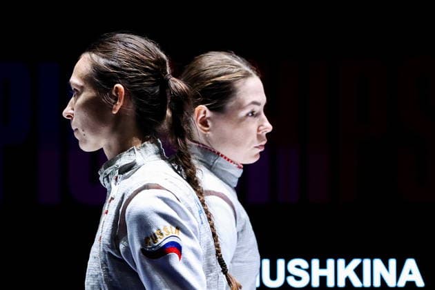 CHINA, HONG KONG - JULY 27, 2026: Russia s Vladislava Peniushkina (front) and Russia s Marta Martyanova during the ladies individual foil event at the 2026 Kerry Fencing World Championships. Mikhail Sinitsyn TASS  95532339