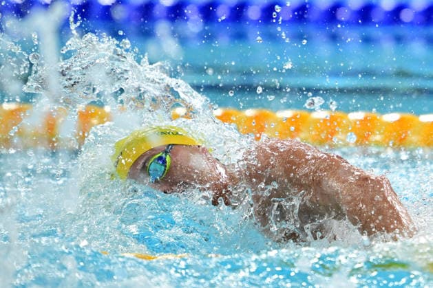 COM26 SWIMMING HEATS, Kai Taylor of Australia competes during the Men™s 100m Freestyle heats at the Glasgow 2026 Commonwealth Games at the Tollcross International Swimming Centre in Glasgow, Scotland, Monday, July 27, 2026. ( NO ARCHIVING, EDITORIAL USE ONLY Glasgow Scotland United Kingdom  Copyright: xDEANxLEWINSx 20260727163880374650