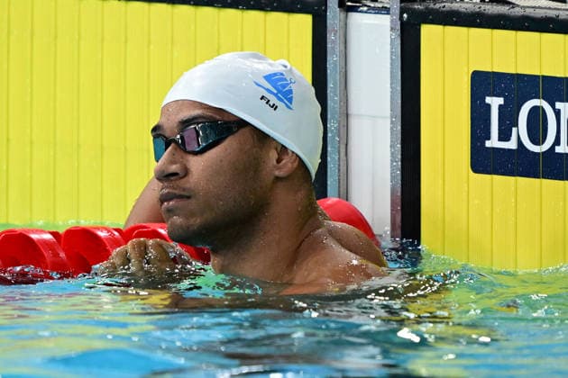 COM26 SWIMMING HEATS, Hansel McCaig of Fiji during the Men™s 100m Freestyle heats at the Glasgow 2026 Commonwealth Games at the Tollcross International Swimming Centre in Glasgow, Scotland, Monday, July 27, 2026. ( NO ARCHIVING, EDITORIAL USE ONLY Glasgow Scotland United Kingdom  Copyright: xDEANxLEWINSx 20260727189858459830