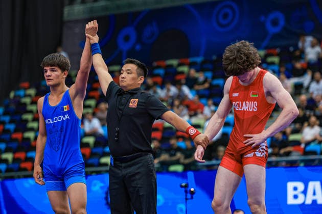 U17, U 17 Wrestling World Championships 65kg GR - Nicolae Cernous (MDA) df. Andrei Mayeuski (BLR) *** U17 Wrestling World Championships, 65 kg Greco-Roman: Nicolae Cernous (MDA) def. Andrei Mayeuski (BLR) Copyright: xUnitedxWorldxWrestlingx xAmirrezx UWW-U17-WC-BAKU-2026