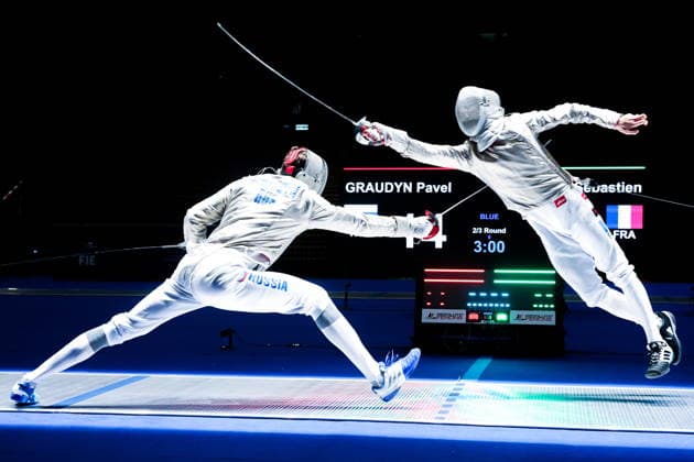 CHINA, HONG KONG - JULY 27, 2026: Russia s Pavel Graudyn (L) and France s Sebastien Patrice compete in the men s individual sabre event at the 2026 Kerry Fencing World Championships. Mikhail Sinitsyn TASS  95534052