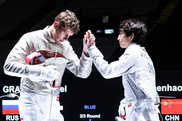 CHINA, HONG KONG - JULY 27, 2026: Russia s Pavel Graudyn (L) and China s Wei Zhenhao compete in the men s individual sabre event at the 2026 Kerry Fencing World Championships 2026 Fencing World Championships In Hong Kong  - ZUMAt113 20260727_zaa_t113_255 Copyright: xMikhailxSinitsynx