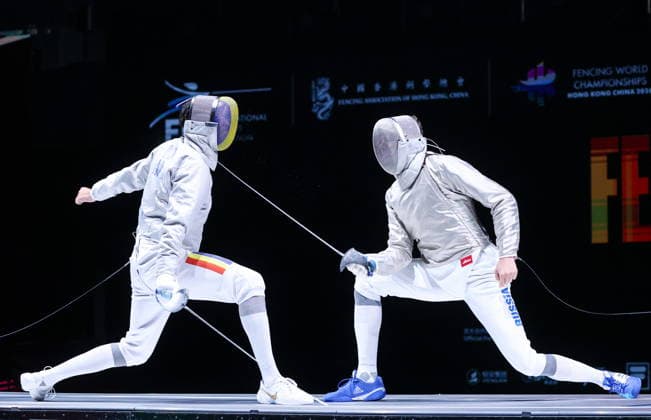 CHINA, HONG KONG - JULY 27, 2026: Romania s Radu Nitu (L) and Russia s Pavel Graudyn compete in the men s individual sabre event at the 2026 Kerry Fencing World Championships. Mikhail Sinitsyn TASS  95535629
