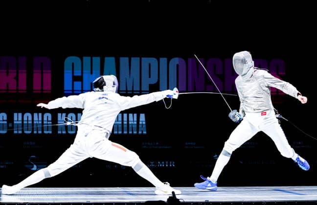 CHINA, HONG KONG - JULY 27, 2026: Romania s Radu Nitu (L) and Russia s Pavel Graudyn compete in the men s individual sabre event at the 2026 Kerry Fencing World Championships. Mikhail Sinitsyn TASS  95535646