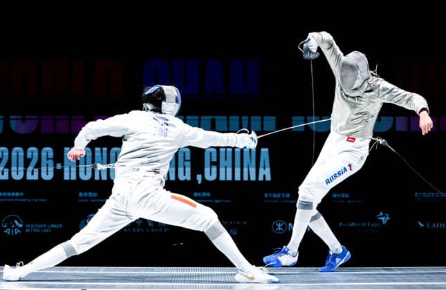 CHINA, HONG KONG - JULY 27, 2026: Romania s Radu Nitu (L) and Russia s Pavel Graudyn compete in the men s individual sabre event at the 2026 Kerry Fencing World Championships 2026 Fencing World Championships In Hong Kong  - ZUMAt113 20260727_zaa_t113_307 Copyright: xMikhailxSinitsynx