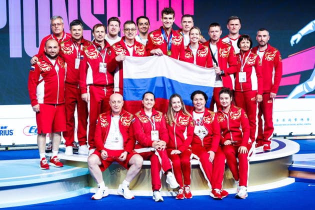 CHINA, HONG KONG - JULY 27, 2026: Athletes of the national fencing team of Russia attend the award ceremony for the men s individual sabre event at the 2026 Kerry Fencing World Championships. Mikhail Sinitsyn TASS  95536153