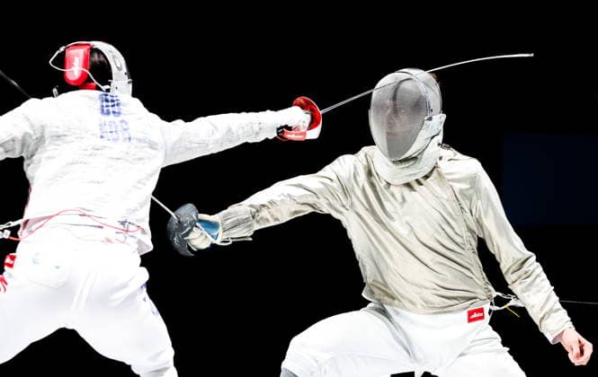 CHINA, HONG KONG - JULY 27, 2026: South Korea s Gyeong-dong Do (L) and Russia s Pavel Graudyn compete in a men s individual sabre event at the 2026 Kerry Fencing World Championships. Mikhail Sinitsyn TASS  95536218