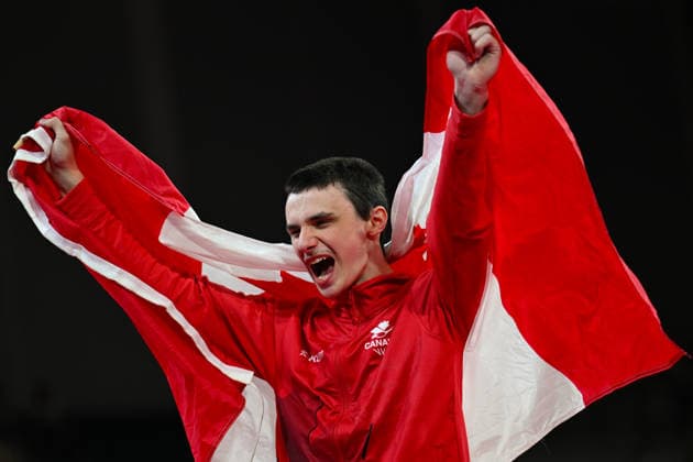 COM26 ARTISTIC GYMNASTICS, Jordan Carroll of Canada celebrates after winning the Artistic Gymnastics Men™s Pommel Horse Final during the Glasgow 2026 Commonwealth Games at the Glasgow International Arena in Glasgow, Scotland, Monday, July 27, 2026. ( NO ARCHIVING, EDITORIAL USE ONLY Glasgow Scotland United Kingdom  Copyright: xLUKASxCOCHx 20260728152054759872