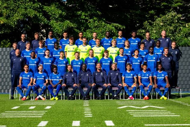 up (L-R), Gent s doctor Jens De Decker, Gent s physiotherapist Frank Wezenbeek, Gent s Mamadou Diallo, Gent s Matties Volckaert, Gent s Aime Omgba, Gent s Siebe Van der Heyden, Gent s Wilfried Kanga, Gent s new player Christian Burgess, Gent s JosuÃ Vergara, Gent s physiotherapist Matti Mortier, Gent s Dirk Rogiest, (second L-R), Gent s physical coach Bram De Winne, Gent s Matisse Samoise, Gent s Tibe De Vlieger, Cercle s Victor Da Silva Vitinho, Gent s goalkeeper Bas Evers, Gent s goalkeeper Kjell Peersman, Gent s goalkeeper Davy Roef, goalkeeper Victor De Coninck, Gent s Lars Cooman, Gent s Bachir Ngom, Gent s Abdelkahar Kadri, Gent s Simon Bourgeois, (third L-R), Gent s keeper coach Bart Van Tornhout, Gent s Hyllarion Goore, Gent s Maksim Paskotsi, Laszlo Benes, Gent s Gilles De Meyer, Gent s Wout Asselman, Gent s Hannes Vernemmen, Gent s Mathias Delorge, Gent s Atsuki Ito, Gent s Ibrahima Cisse, Gent s head of performance Stijn Matthys, (under L-R), Gent s Mohammed El Adfaoui, Gent s Max Dean, Gent s El Hadji Seck, Essevee s assistant coach Dwight Waeytens, Gent s assistant coach M Baye Leye, Gent s head coach Rik De Mil, Gent s assistant coach Hans Cornelis, Gent s Tiago Araujo, Gent s Momodou Lamin Sonko and Gent s Abdoul Ayinde pose for a team photo at the 2026-2027 season photoshoot of Belgian Jupiler Pro League team KAA Gent, Monday 27 July 2026 in Gent. KURTxDESPLENTER  x182164352x