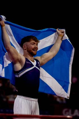 GLASGOW, SCOTLAND - JULY 27: Cameron LYNN of Scotland celebrates his Bronze Medal in the Men’s Pommel Horse Final at The Arena, Glasgow on July 27, 2026 in Glasgow, Scotland. (Photo by Claire Jeffrey Sports Press Photo)  Copyright: xClairexJeffreyx xSPPx Sportspressphoto_SPR197881