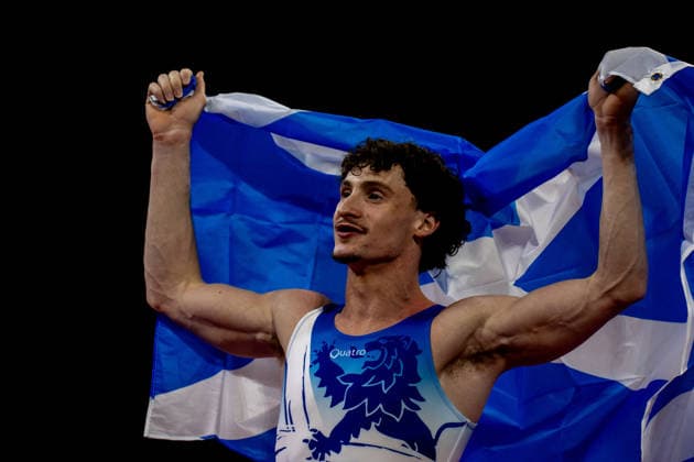 GLASGOW, SCOTLAND - JULY 27: Reuben WARD of Scotland celebrates his Silver Medal in the Men’s Pommel Horse Final at The Arena, Glasgow on July 27, 2026 in Glasgow, Scotland. (Photo by Claire Jeffrey Sports Press Photo)  Copyright: xClairexJeffreyx xSPPx Sportspressphoto_SPR197885