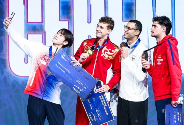 CHINA, HONG KONG - JULY 27, 2026: 2nd placed Gyeongdong Do of South Korea, 1st placed Pavel Graudyn of Russia, and 3rd placed Mohamed Amer of Egypt and Radu Nitu of Romania (L-R) pose for a selfie during the award ceremony for the men s individual sabre event at the 2026 Kerry Fencing World Championships. Mikhail Sinitsyn TASS  95536410