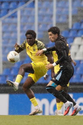 CONCACAF U-20 Championship: Antigua and Barbuda vs. Guatemala Brandon Satchell (L) of Antigua and Barbuda battles for the ball with Jorge Gonzalez (R) of Guatemala during a CONCACAF U-20 Championship match between Antigua and Barbuda and Guatemala, played at the Estadio Universitario in Puebla, Mexico, 27 July 2026. Puebla Mexico  Copyright: xHildaxRiosx