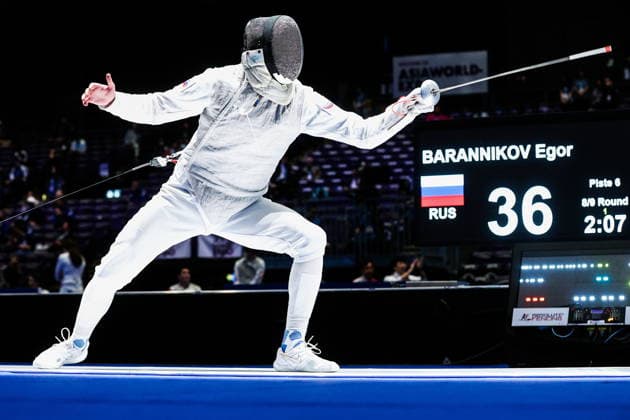 CHINA, HONG KONG - JULY 28, 2026: Athlete Yegor Barannikov of Russia fights in his foil bout during the 2026 Kerry Fencing World Championships. Mikhail Sinitsyn TASS  95553138