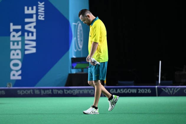 COM26 BOWLS, Aaron Wilson of Australia competes in his bronze medal lawn bowls match at the Glasgow 2026 Commonwealth Games at SEC Centre Hall 3 in Glasgow, Scotland, Tuesday, July 28, 2026. ( NO ARCHIVING, EDITORIAL USE ONLY Glasgow Scotland United Kingdom  Copyright: xDEANxLEWINSx 20260728110942268556