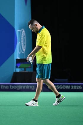 COM26 BOWLS, Aaron Wilson of Australia competes in his bronze medal lawn bowls match at the Glasgow 2026 Commonwealth Games at SEC Centre Hall 3 in Glasgow, Scotland, Tuesday, July 28, 2026. ( NO ARCHIVING, EDITORIAL USE ONLY Glasgow Scotland United Kingdom  Copyright: xDEANxLEWINSx 20260728133566582979