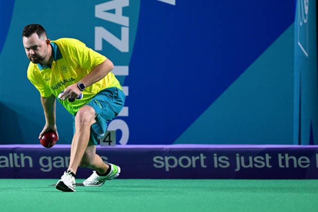 COM26 BOWLS, Aaron Wilson of Australia competes in his bronze medal lawn bowls match against Gary Kelly of Northern Ireland at the Glasgow 2026 Commonwealth Games at SEC Centre Hall 3 in Glasgow, Scotland, Tuesday, July 28, 2026. ( NO ARCHIVING, EDITORIAL USE ONLY Glasgow Scotland United Kingdom  Copyright: xDEANxLEWINSx 20260728162493154086