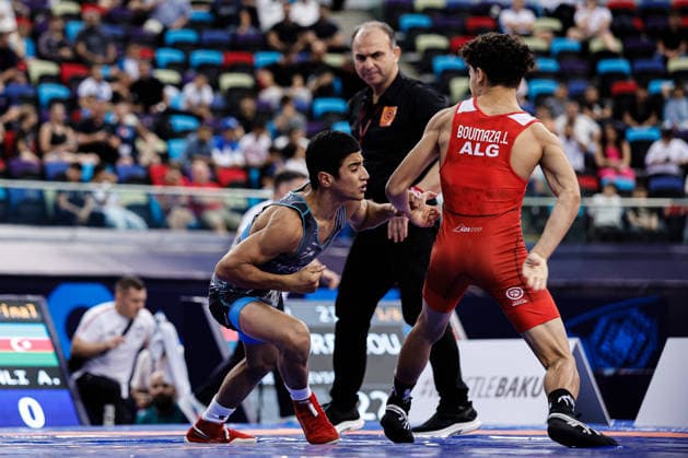 U17, U 17 Wrestling World Championships 51kg GR - Abdurrahman Huseynli (AZE) df. Lyes Boumaza (ALG) *** U17 Wrestling World Championships, 51 kg Greco-Roman: Abdurrahman Huseynli (AZE) defeated Lyes Boumaza (ALG) Copyright: xKostadinxAndonovx UWW-U17-WC-BAKU-2026