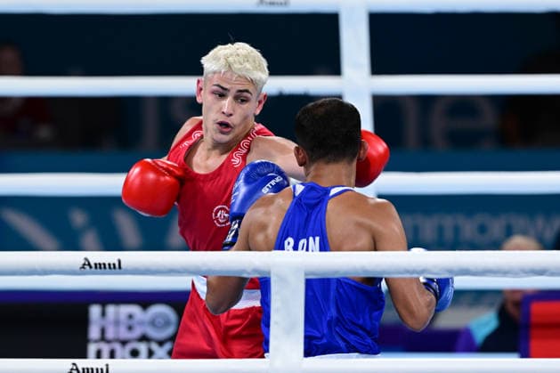 COM26 BOXING, Jye Dixon (red) of Australia in action during his Quarter Final match against Md Rakib Hossain (blue) of Bangladesh during the Glasgow 2026 Commonwealth Games at SEC Centre in Glasgow, United Kingdom, Tuesday, July 28, 2026. ( NO ARCHIVING, EDITORIAL USE ONLY, AUSTRALIA ONLY Glasgow Scotland United Kingdom  Copyright: xDEANxLEWEINSx 20260728178773461787