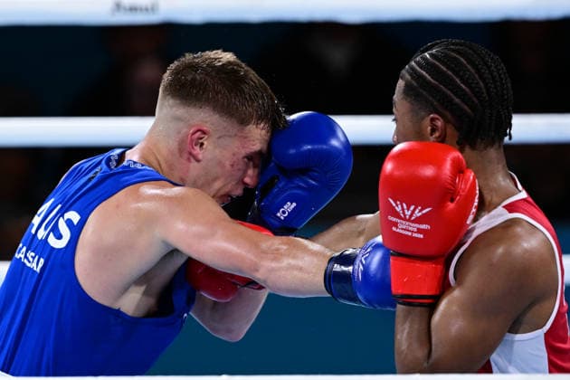 COM26 BOXING, Jacob Cassar (blue) of Australia in action during his Quarter Final match against Gabriel Labrie (red) of Canada during the Glasgow 2026 Commonwealth Games at SEC Centre in Glasgow, United Kingdom, Tuesday, July 28, 2026. ( NO ARCHIVING, EDITORIAL USE ONLY, AUSTRALIA ONLY Glasgow Scotland United Kingdom  Copyright: xDEANxLEWEINSx 20260728153503524081