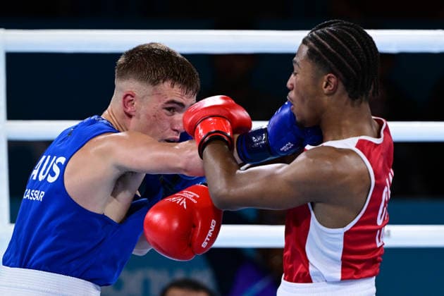 COM26 BOXING, Jacob Cassar (blue) of Australia in action during his Quarter Final match against Gabriel Labrie (red) of Canada during the Glasgow 2026 Commonwealth Games at SEC Centre in Glasgow, United Kingdom, Tuesday, July 28, 2026. ( NO ARCHIVING, EDITORIAL USE ONLY, AUSTRALIA ONLY Glasgow Scotland United Kingdom  Copyright: xDEANxLEWEINSx 20260728121100319846