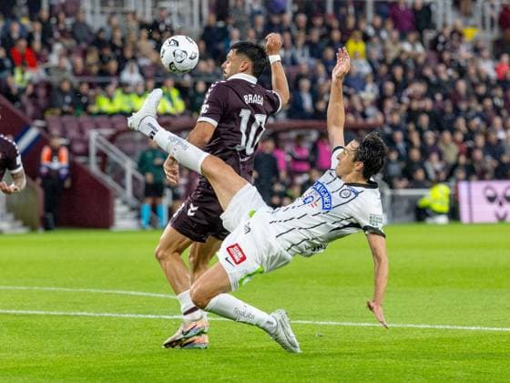 Albert Vallci, of SK Sturm Graz clears from Claudio Braga of Heart of Midlothian during the Hearts v Sturm Graz second leg of their Champions League second qualifying round at Tynecastle Stadium on Tuesday 28th July 2026 Heart of Midlothian v Sturm Graz, UEFA Champions League, 2nd Qualifying Round, 2nd Leg, Football, Tynecastle Park, Edinburgh, Scotland, UK - 28 Jul 2026Edinburgh Tynecastle Park Scotland United Kingdom  Copyright: xAlanxRennie Shutterstockx 17015998bi
