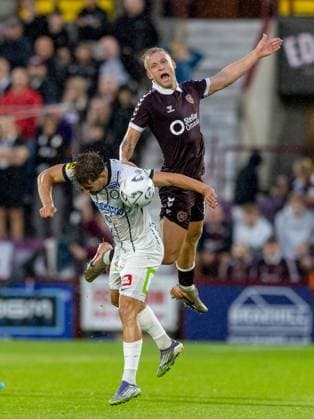 Simon Seidl, of SK Sturm Graz and Harry Milne of Heart of Midlothian compete for possession of the ball during the Hearts v Sturm Graz second leg of their Champions League second qualifying round at Tynecastle Stadium on Tuesday 28th July 2026 Heart of Midlothian v Sturm Graz, UEFA Champions League, 2nd Qualifying Round, 2nd Leg, Football, Tynecastle Park, Edinburgh, Scotland, UK - 28 Jul 2026Edinburgh Tynecastle Park Scotland United Kingdom  Copyright: xAlanxRennie Shutterstockx 17015998bk