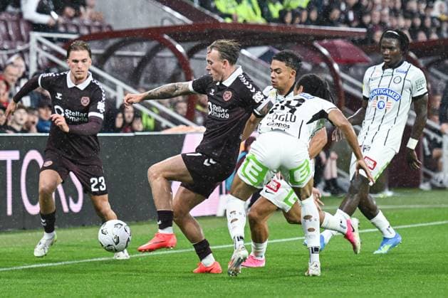 Heart of Midlothian v SK Sturm Graz UEFA Champions League Calvin Miller of Heart of Midlothian and Emran Soglo of SK Sturm Graz battle during the UEFA Champions League Second Qualifying Round Second Leg match at Tynecastle Park, Edinburgh 28 07 2026 UK Newspapers OUT Copyright: xJamiexJohnstonx FIL-23685-0068