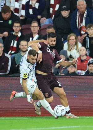 Heart of Midlothian v SK Sturm Graz UEFA Champions League Jürgen Heil of SK Sturm Graz competes for the ball with Cl‡udio Braga of Heart of Midlothian during the UEFA Champions League Second Qualifying Round Second Leg match at Tynecastle Park, Edinburgh 28 07 2026 UK Newspapers OUT Copyright: xFredxPalmerx FIL-23686-0131