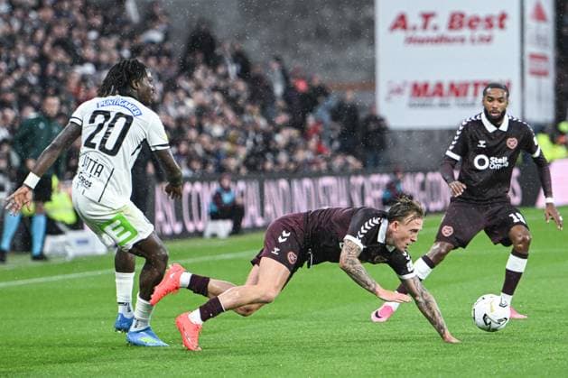 Heart of Midlothian v SK Sturm Graz UEFA Champions League Calvin Miller of Heart of Midlothian is fouled by Seedy Jatta of SK Sturm Graz during the UEFA Champions League Second Qualifying Round Second Leg match at Tynecastle Park, Edinburgh 28 07 2026 UK Newspapers OUT Copyright: xJamiexJohnstonx FIL-23685-0070