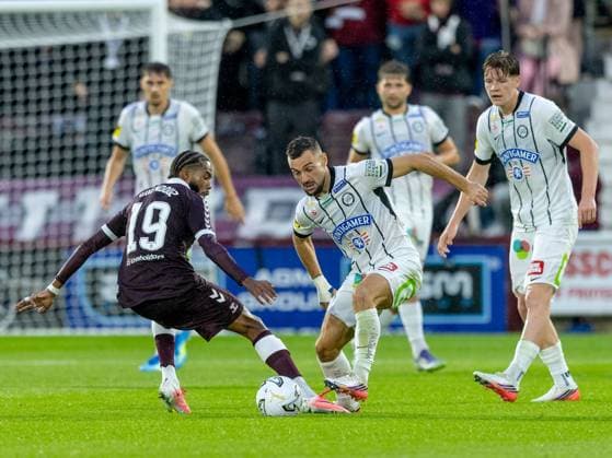 Z28z takes on Sabri Guendouz of Heart of Midlothian during the Hearts v Sturm Graz second leg of their Champions League second qualifying round at Tynecastle Stadium on Tuesday 28th July 2026 Heart of Midlothian v Sturm Graz, UEFA Champions League, 2nd Qualifying Round, 2nd Leg, Football, Tynecastle Park, Edinburgh, Scotland, UK - 28 Jul 2026Edinburgh Tynecastle Park Scotland United Kingdom  Copyright: xAlanxRennie Shutterstockx 17015998dr