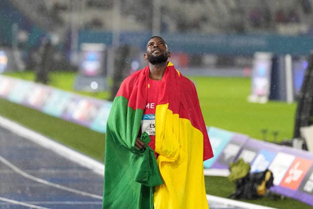 RECORD DATE NOT STATED 28th July 2026; Glasgow, Scotland; 2026 Commonwealth Games, Day Six; Emmanuel Eseme of Cameroon reacts in a Cameroon flag after winning the Mens 100m final with a time of 9 83 seconds AlecxBrown