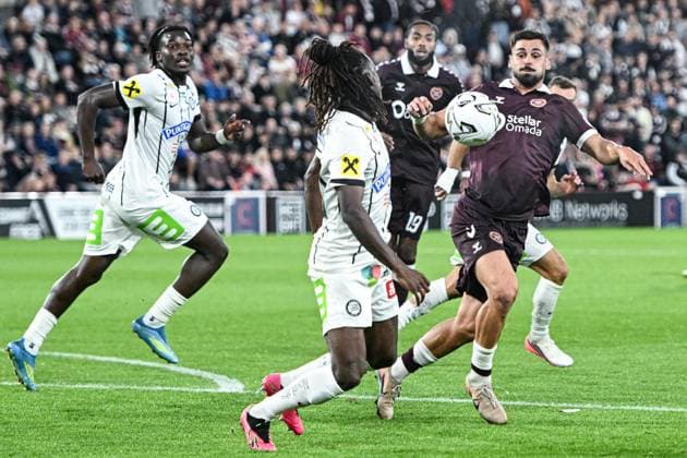 Heart of Midlothian v SK Sturm Graz UEFA Champions League Claudio Braga of Heart of Midlothian chests the ball during the UEFA Champions League Second Qualifying Round Second Leg match at Tynecastle Park, Edinburgh 28 07 2026 UK Newspapers OUT Copyright: xJamiexJohnstonx FIL-23685-0157