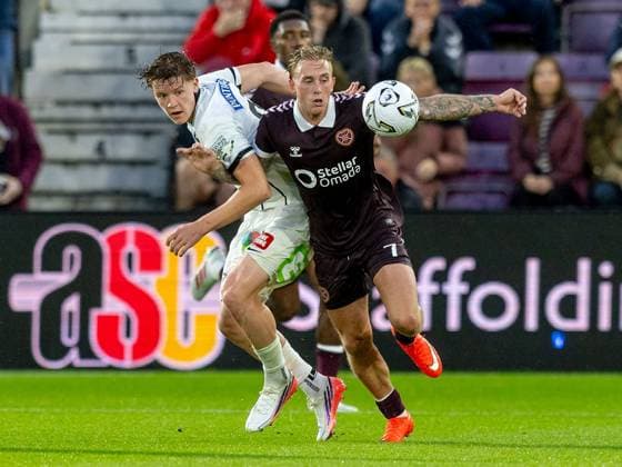 Luca Weinhandl, of SK Sturm Graz and Calvin Miller of Heart of Midlothian compete for possession of the ball during the Hearts v Sturm Graz second leg of their Champions League second qualifying round at Tynecastle Stadium on Tuesday 28th July 2026 Heart of Midlothian v Sturm Graz, UEFA Champions League, 2nd Qualifying Round, 2nd Leg, Football, Tynecastle Park, Edinburgh, Scotland, UK - 28 Jul 2026Edinburgh Tynecastle Park Scotland United Kingdom  Copyright: xAlanxRennie Shutterstockx 17015998fc