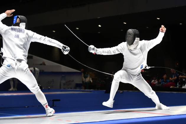 Fechten, WM in Hongkong #2 (260729) -- HONG KONG, July 29, 2026 -- Lan Minghao (R) of China competes with Lucas Malcotti of Switzerland during the team men s epee round of 16 match between China and Switzerland at the 2026 Fencing World Championships in Hong Kong, south China, July 29, 2026. ) (SP)CHINA-HONG KONG-FENCING-WORLD CHAMPIONSHIPS-MEN S EPEE TEAM (CN) LoxPingxFai 