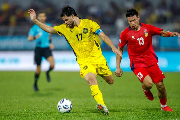 ASEAN Hyundai Cup 2026 Malaysia Vs Laos in Kuala Lumpur, Malaysia - 28 Jul 2026 Sturmer Dos Reis Paulo Josue of Malaysia (L) and Viengxay Sidavong of Laos seen in action during the ASEAN Hyundai Cup 2026 match between Malaysia and Laos at Kuala Lumpur Football Stadium, Cheras. Final score; Malaysia 4:0 Laos. Kuala Lumpur Malaysia Copyright: xWongxFokxLoyx xSOPAxImagesx 20260728_AFW_0977 copy