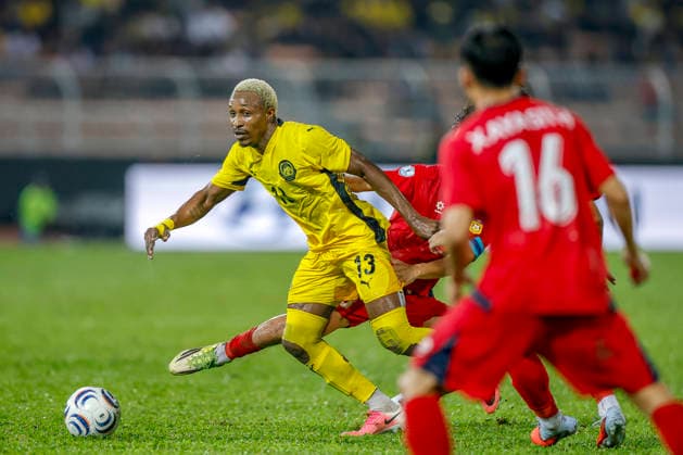 July 28, 2026, Kuala Lumpur, Malaysia: Mohamadou Sumareh of Malaysia (L) and Damoth Thongkhamsavath of Laos seen in action during the ASEAN Hyundai Cup 2026 match between Malaysia and Laos at Kuala Lumpur Football Stadium, Cheras. Final score; Malaysia 4:0 Laos. Kuala Lumpur Malaysia - ZUMAs197 20260728_aaa_s197_300 Copyright: xWongxFokxLoyx
