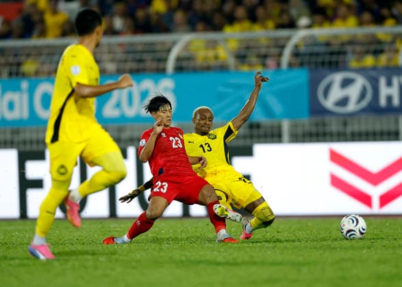 July 28, 2026, Kuala Lumpur, Malaysia: Phonsak Seesavath of Laos (C) and Mohamadou Sumareh of Malaysia seen in action during the ASEAN Hyundai Cup 2026 match between Malaysia and Laos at Kuala Lumpur Football Stadium, Cheras. Final score; Malaysia 4:0 Laos. Kuala Lumpur Malaysia - ZUMAs197 20260728_aaa_s197_308 Copyright: xWongxFokxLoyx