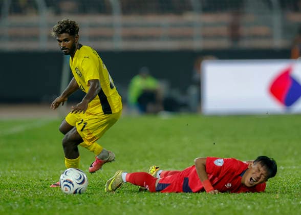 July 28, 2026, Kuala Lumpur, Malaysia: Pavithran Gunalan of Malaysia (L) and Vilay Kulungsy of Laos seen in action during the ASEAN Hyundai Cup 2026 match between Malaysia and Laos at Kuala Lumpur Football Stadium, Cheras. Final score; Malaysia 4:0 Laos. Kuala Lumpur Malaysia - ZUMAs197 20260728_aaa_s197_309 Copyright: xWongxFokxLoyx